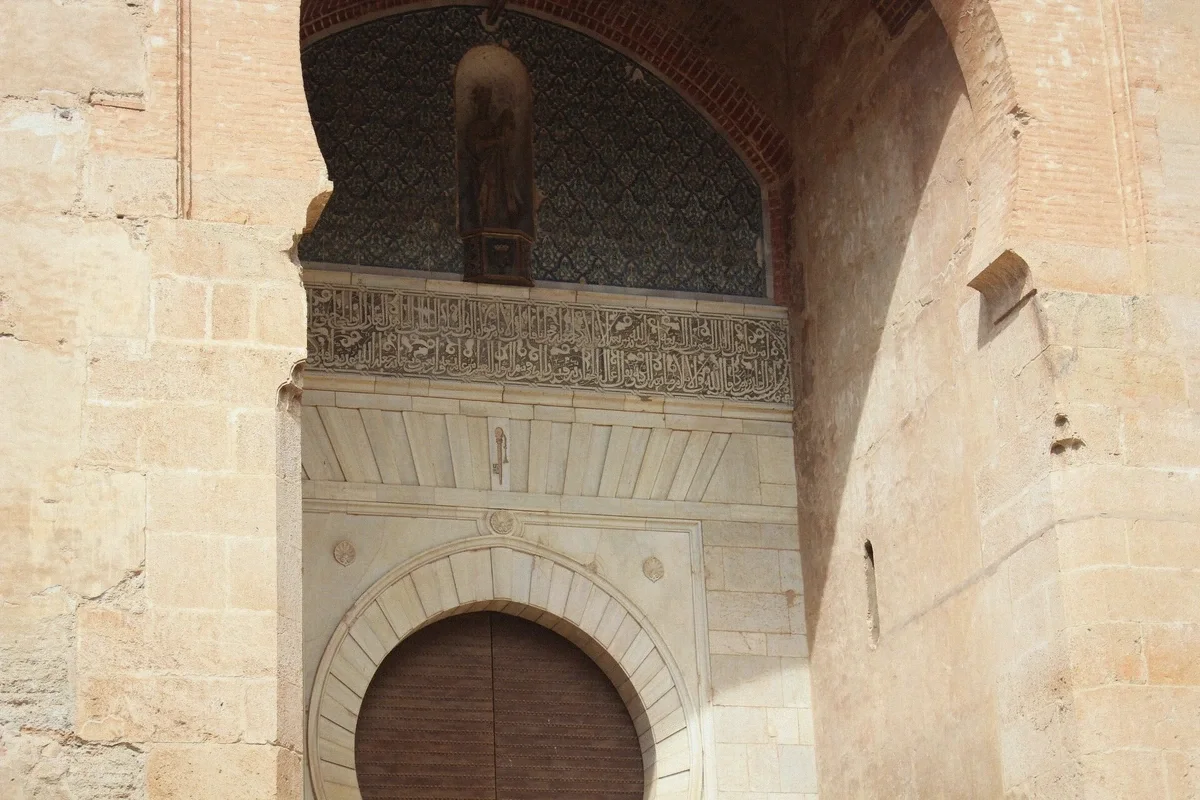 Carved stone details of the Puerta de la Justicia gate at the Alhambra, Granada