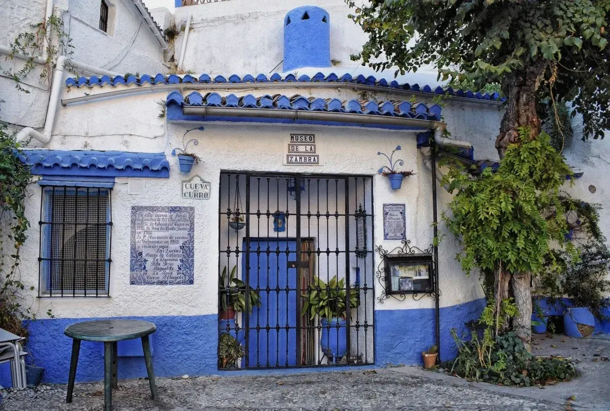 Whitewashed cave dwellings on the Sacromonte hillside in Granada, Spain